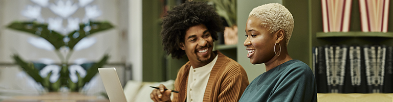 African American co-workers happily working together